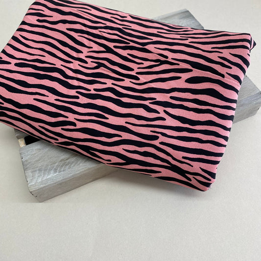 Radiance Zebra Stripe Viscose Dress Fabric Strawberry Ice 4.1m
